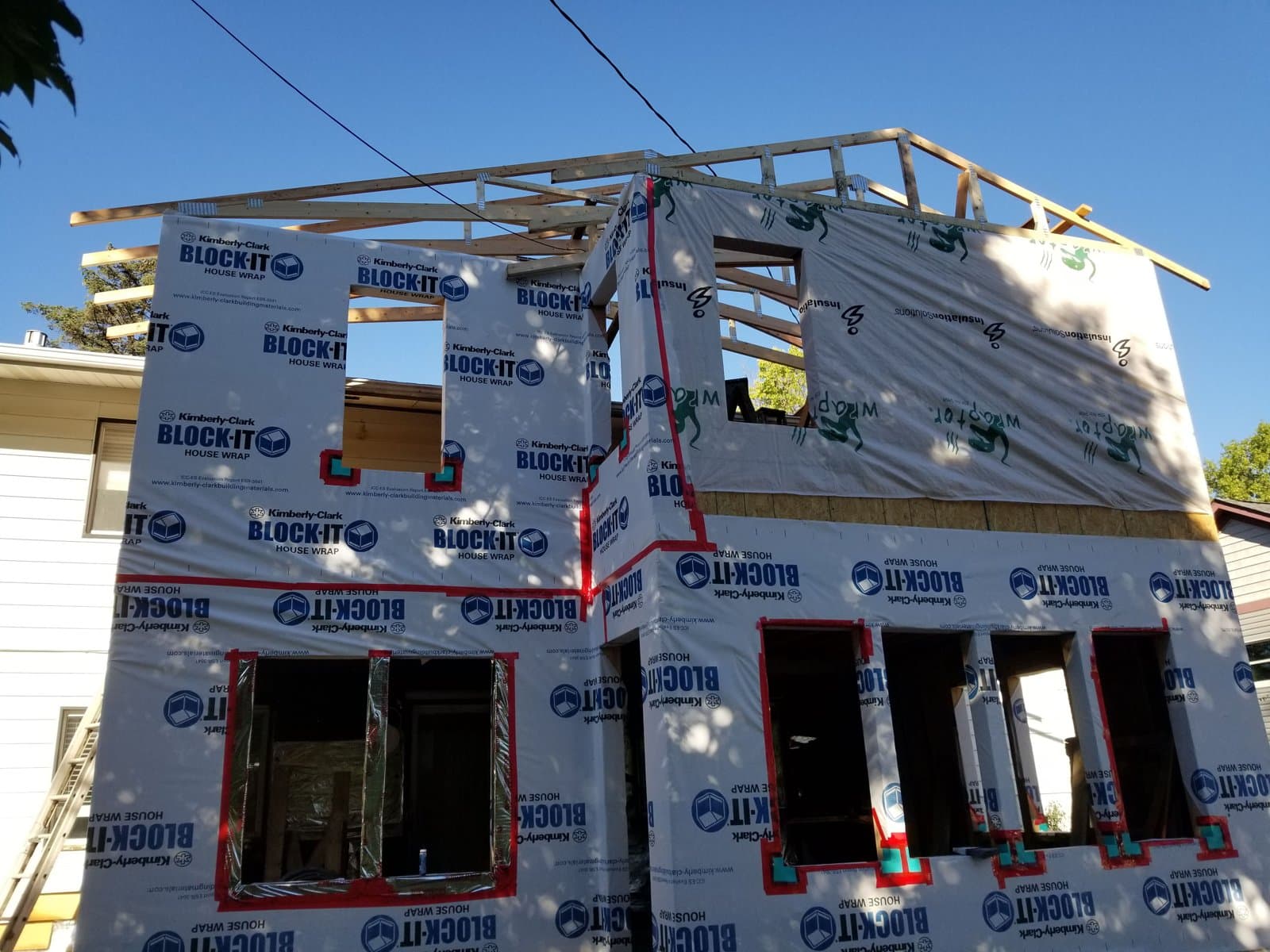 Two stories framed and sheathed, roof going on, September 22