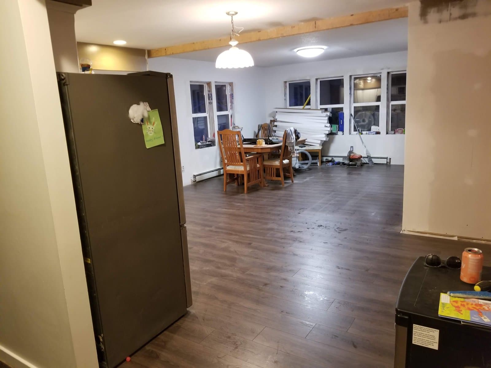 Plank flooring going down in the new dining room, May 2019