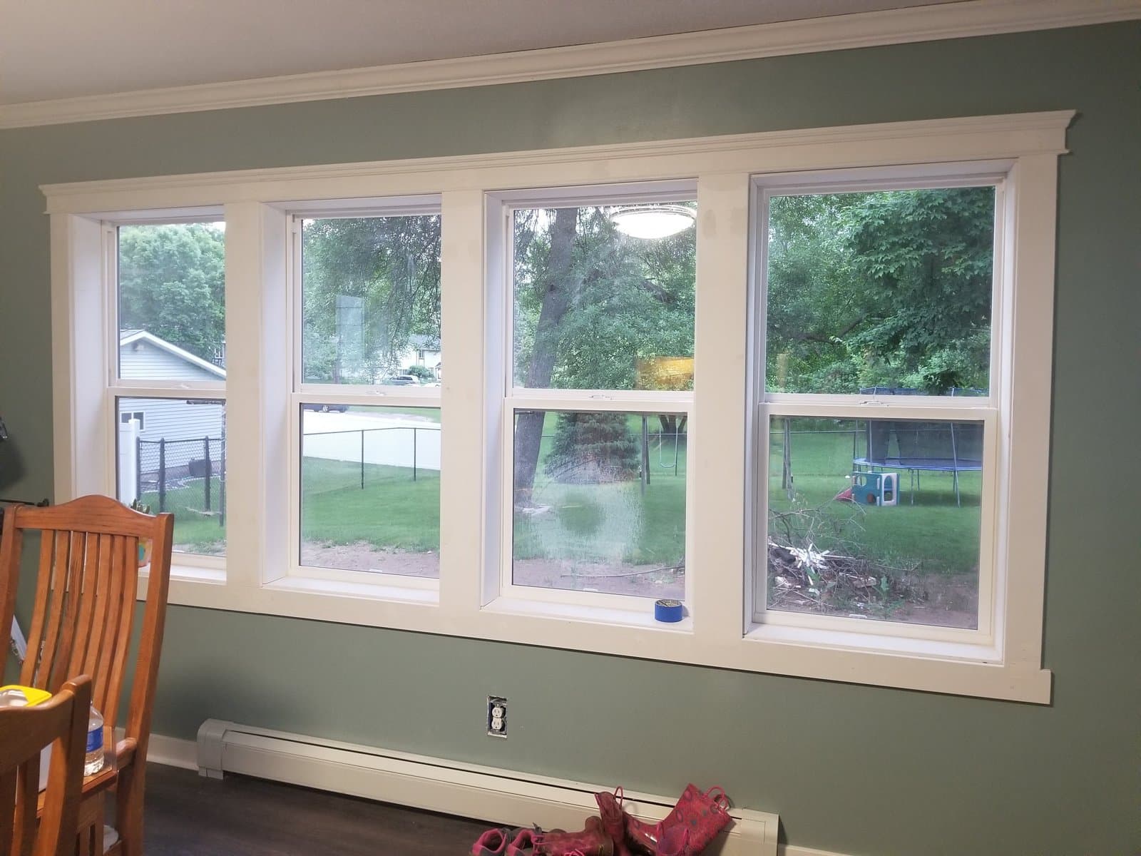 The dining room windows, trimmed and painted