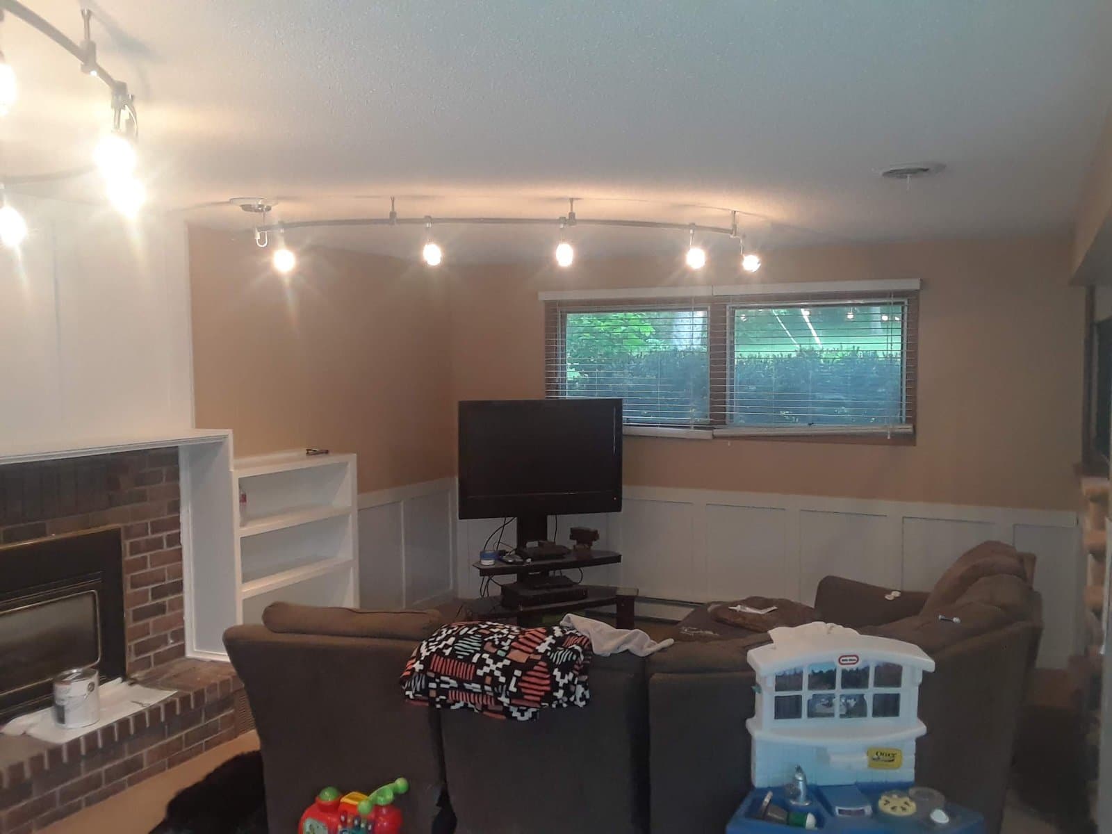 Finished built-ins and track lighting over the family room, June 2018