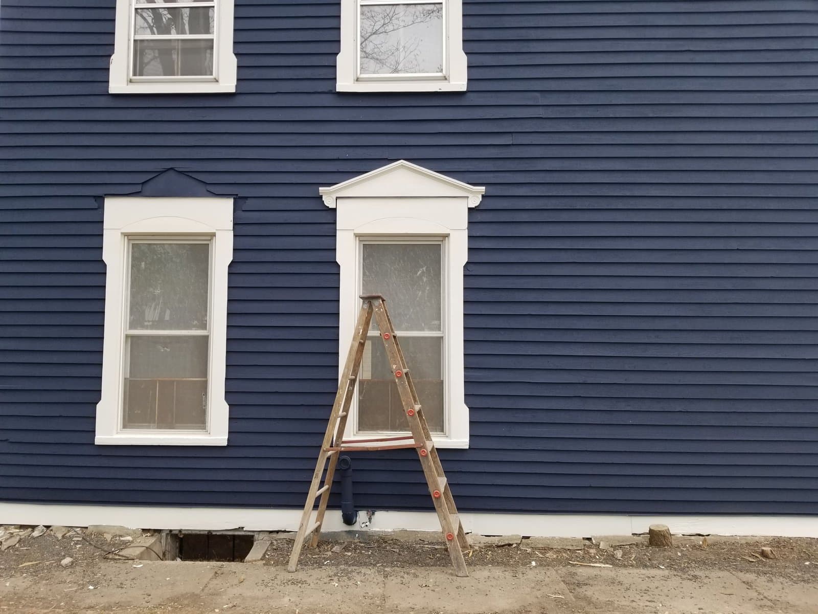 Painted: blue clapboard, white trim, May 2020