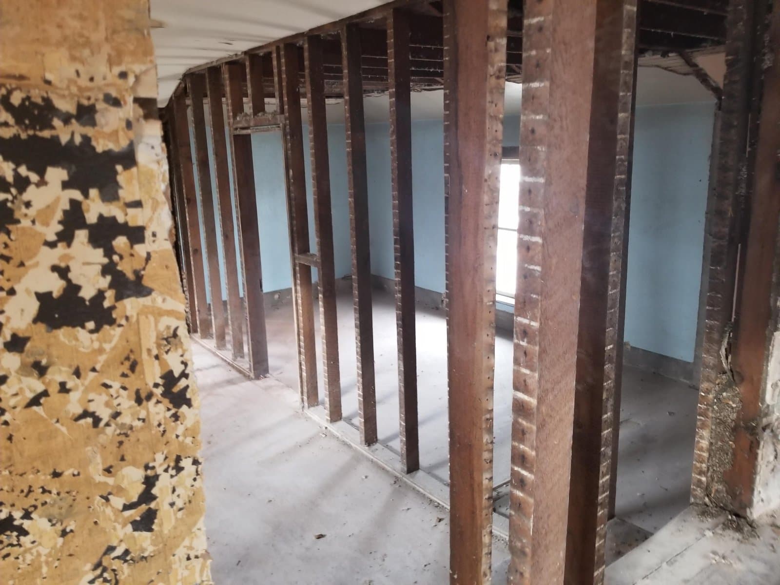 Original studs and lath exposed