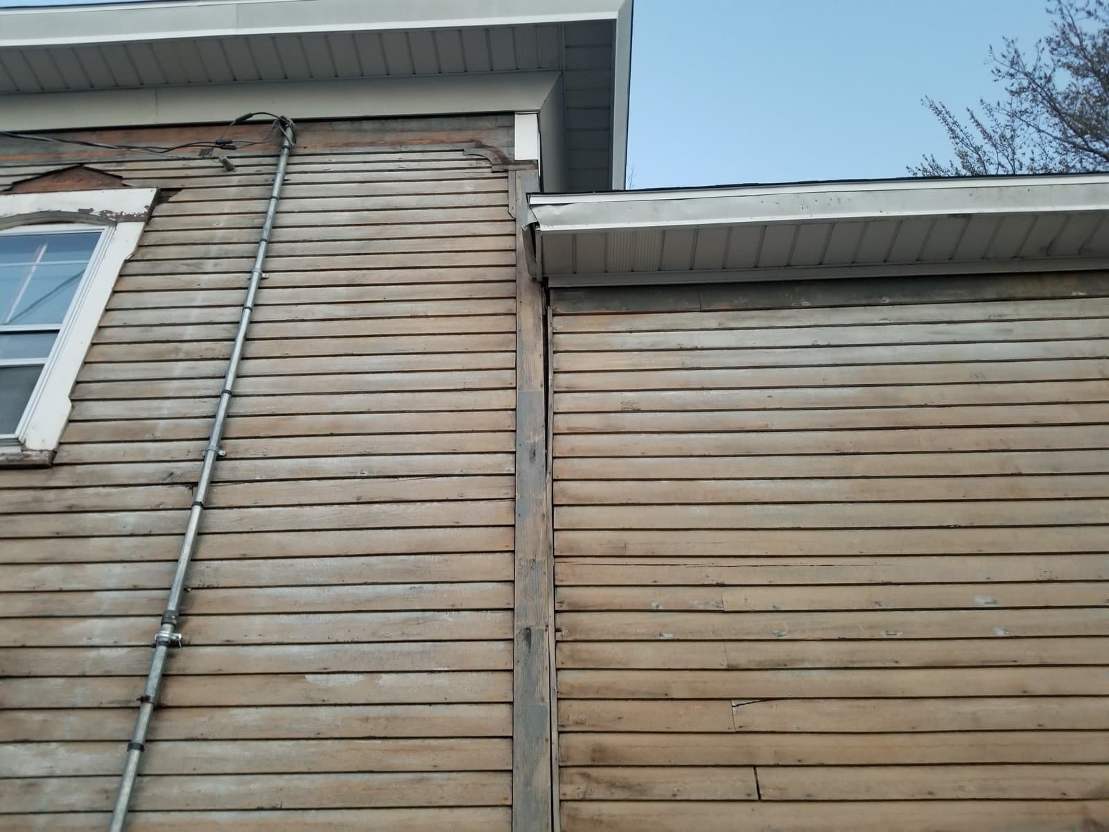 Stripping the old siding