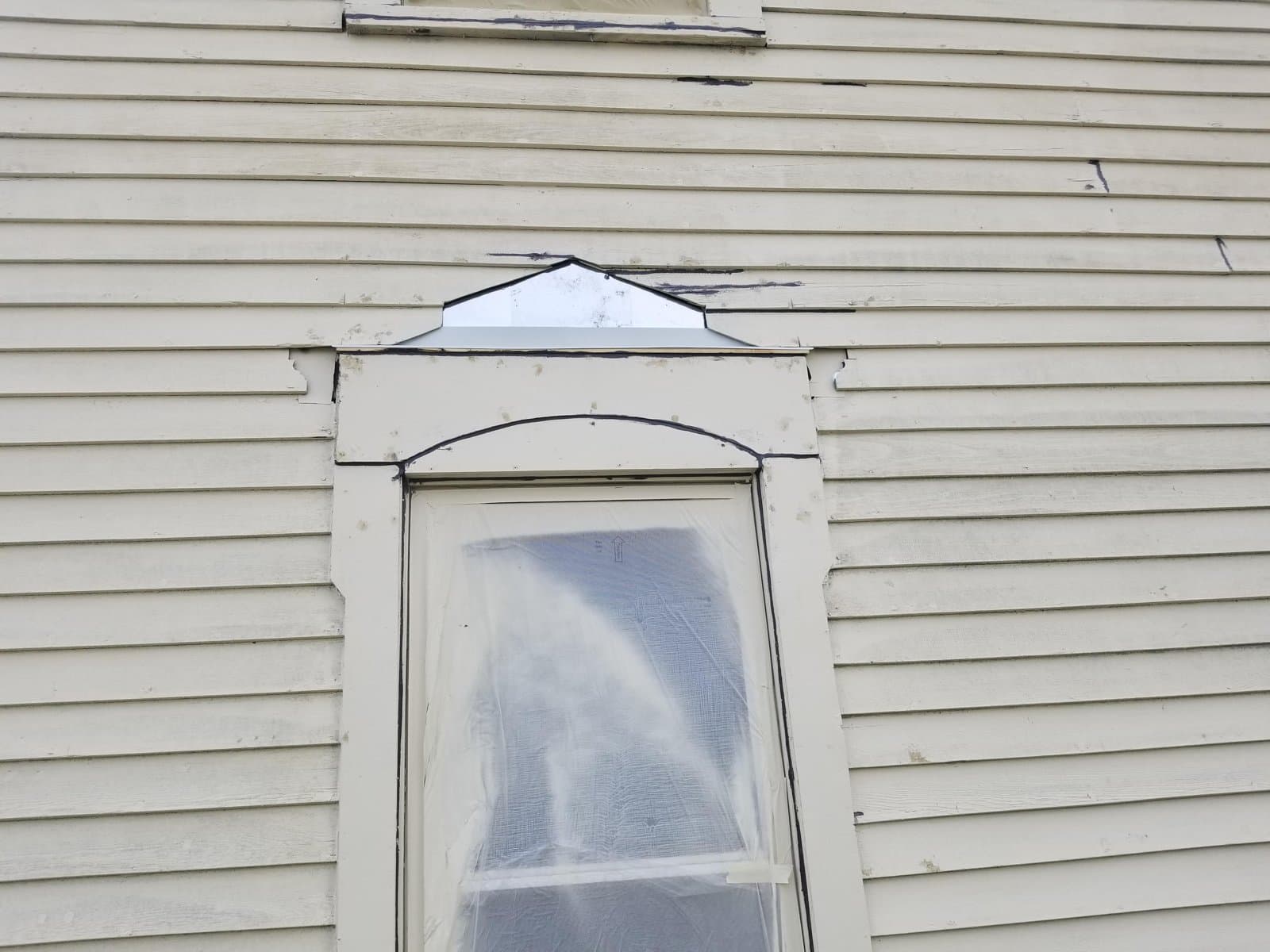 Window trim repaired before paint