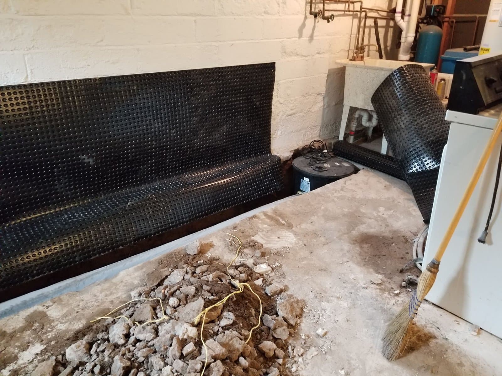 Perimeter trench with the broken slab piled