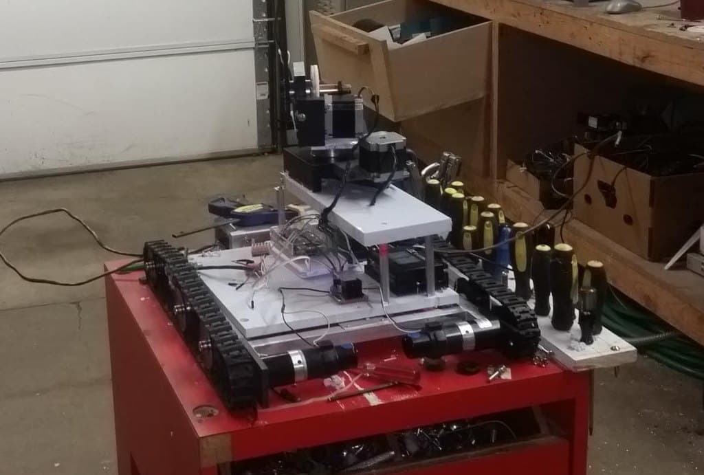 The chassis up close: tracks, stepper motors, the wiring
